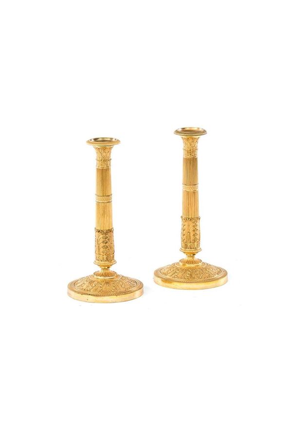 Coppia di candelieri ad una fi  - Asta Antiquariato - Incanto Casa d'Aste e Galleria