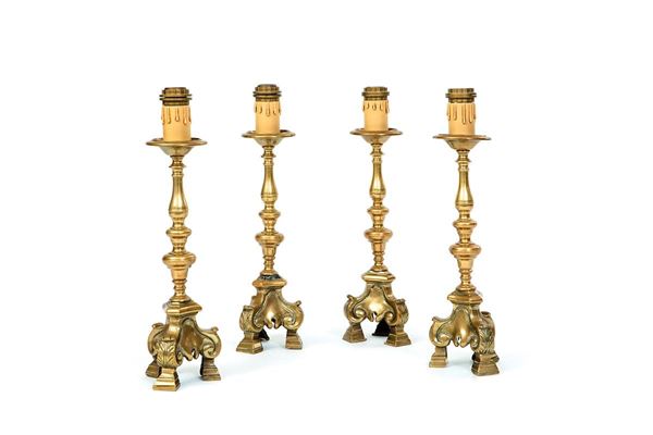 Quattro candelieri in bronzo t