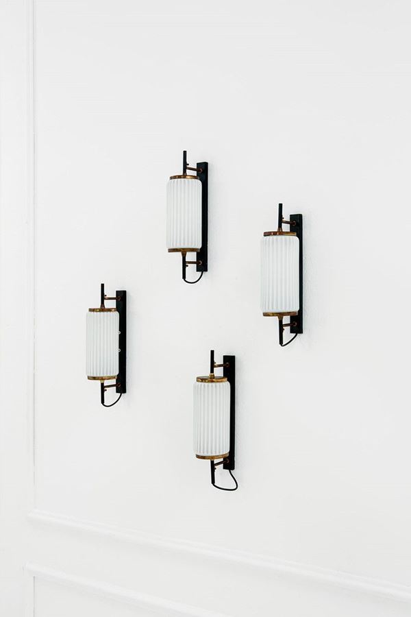 Quattro lampade da parete
Met