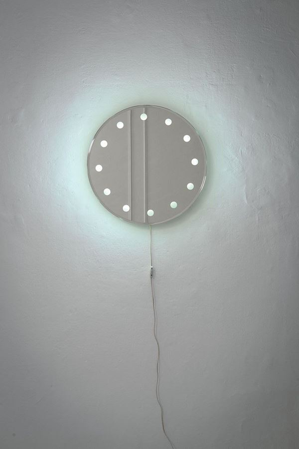 Specchio retroilluminato
Stru