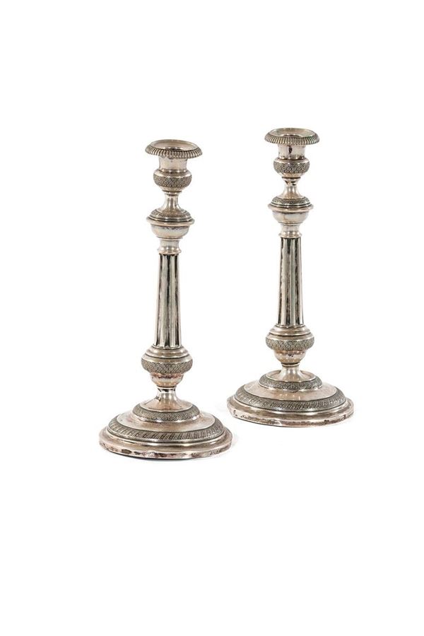 Coppia di candelieri in argent