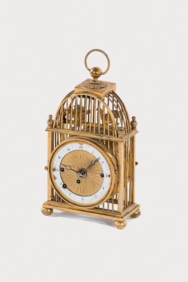 Orologio inserito in una gabbi  - Asta Antiquariato - Incanto Casa d'Aste e Galleria