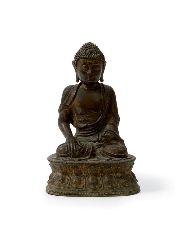 Buddha in bronzo con tracce di