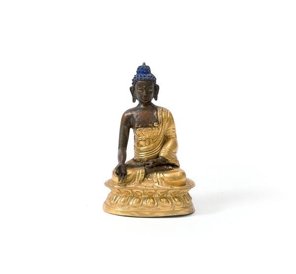 Buddha in rame sbalzato e dora