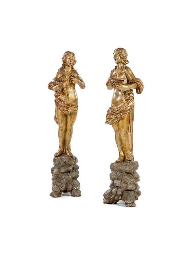 Coppia di sculture portacero i