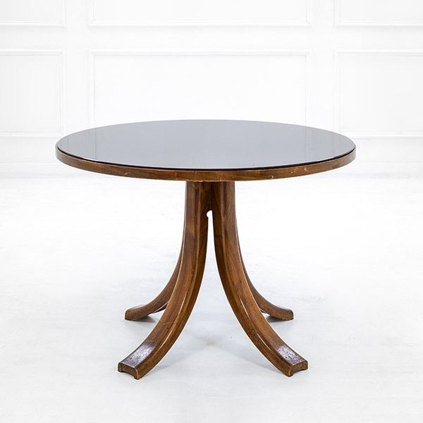 Osvaldo Borsani : Tavolo rotondo
Legno di noce,  - Auction Design - Incanto Casa d'Aste e Galleria