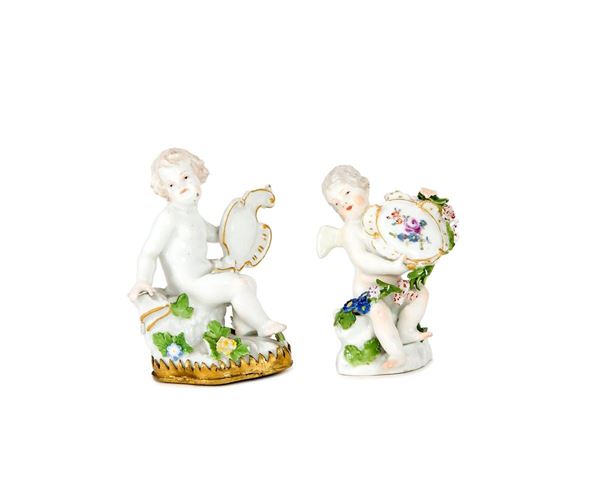 Due figure di putti con cartig
