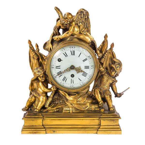 Orologio in bronzo dorato con 