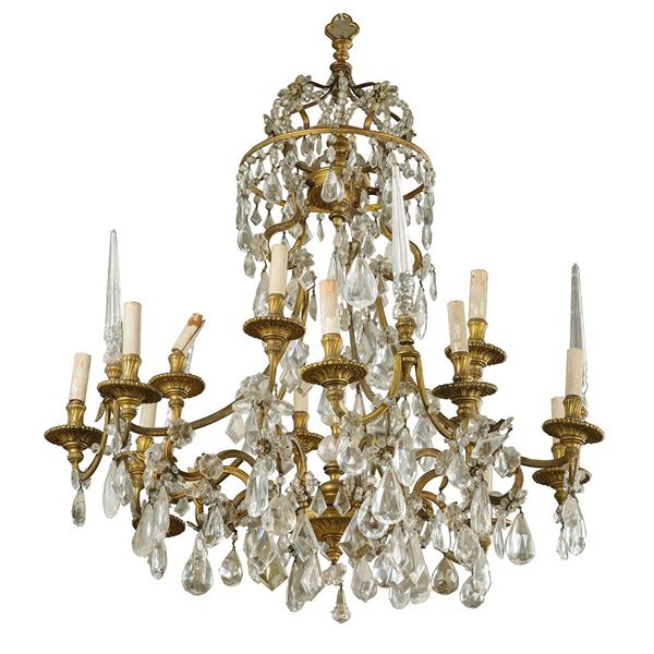 Lampadario a sedici luci in br  - Asta Antiquariato - Incanto Casa d'Aste e Galleria