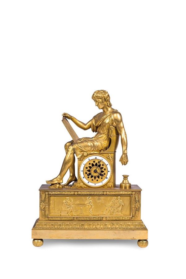 Orologio in bronzo dorato e fi