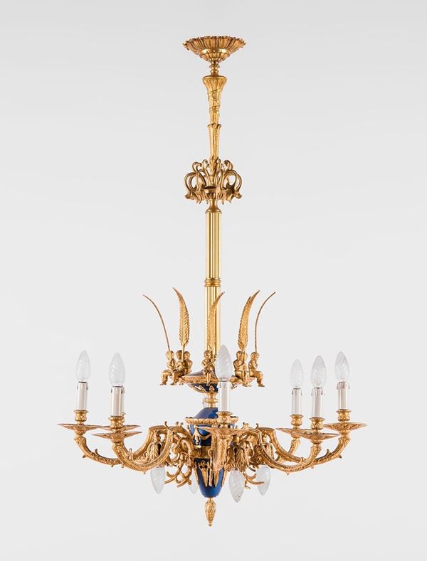 Lampadario in bronzo dorato e 