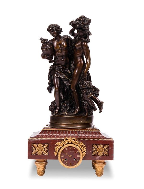 Orologio in marmo con sovrasta  - Asta Antiquariato, Pittura, Oggetti d'arte, Porcellana, Arte Moderna - Incanto Casa d'Aste e Galleria