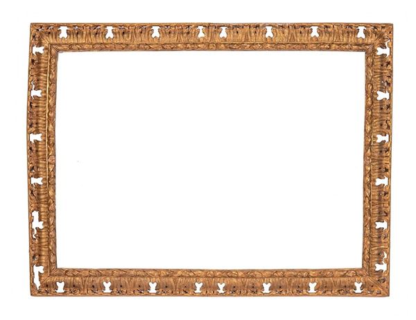 Grande cornice in legno dorato