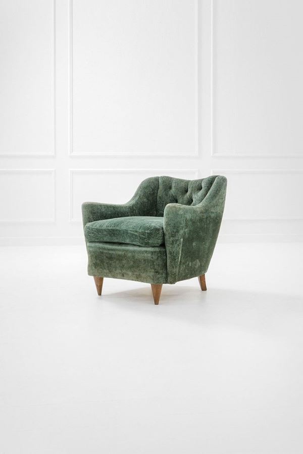 Poltrona
Legno, tessuto.
194