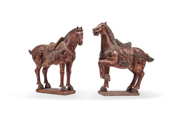Due cavalli in legno scolpito