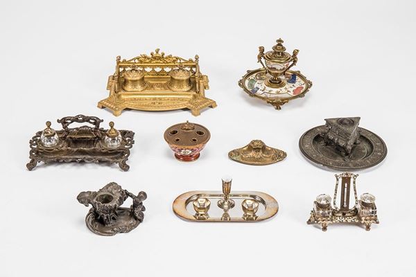 Nove calamai in materiali diversi, XIX-XX secolo.