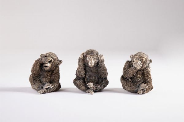 Tre figure di scimmiette in argento