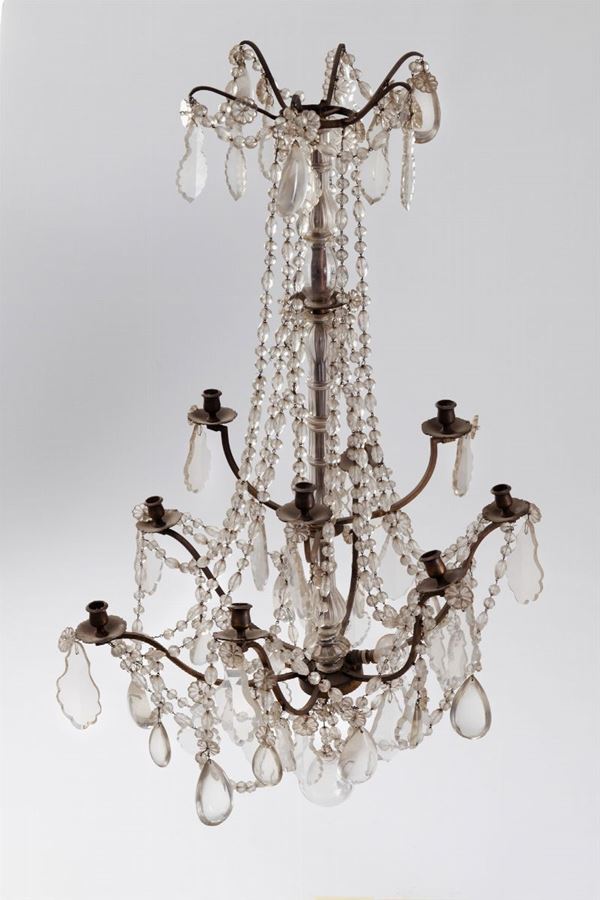 Lampadario in ferro e cristalli