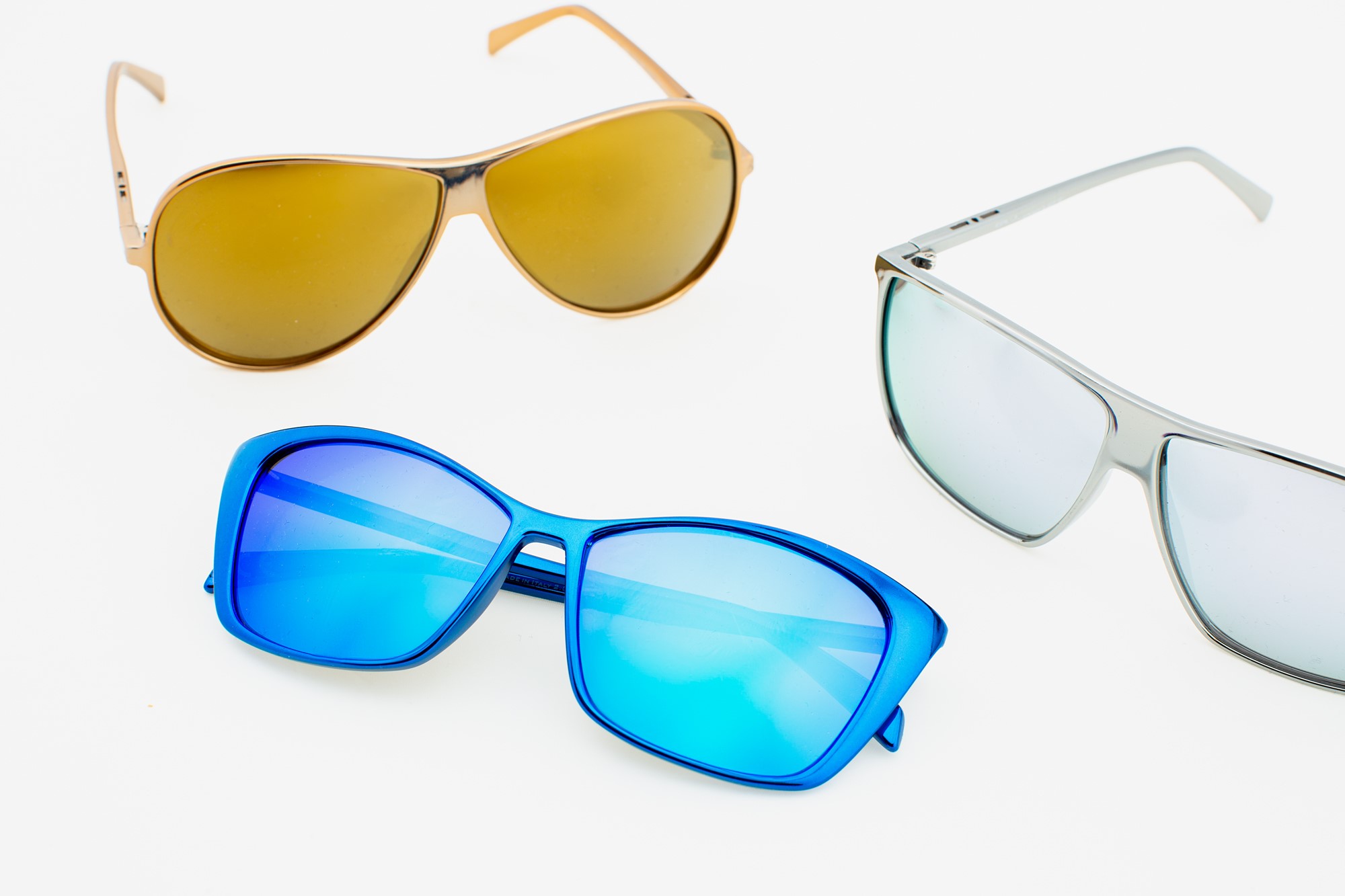 12 Sunglasses from the Plastic series (gold, blue, silver)