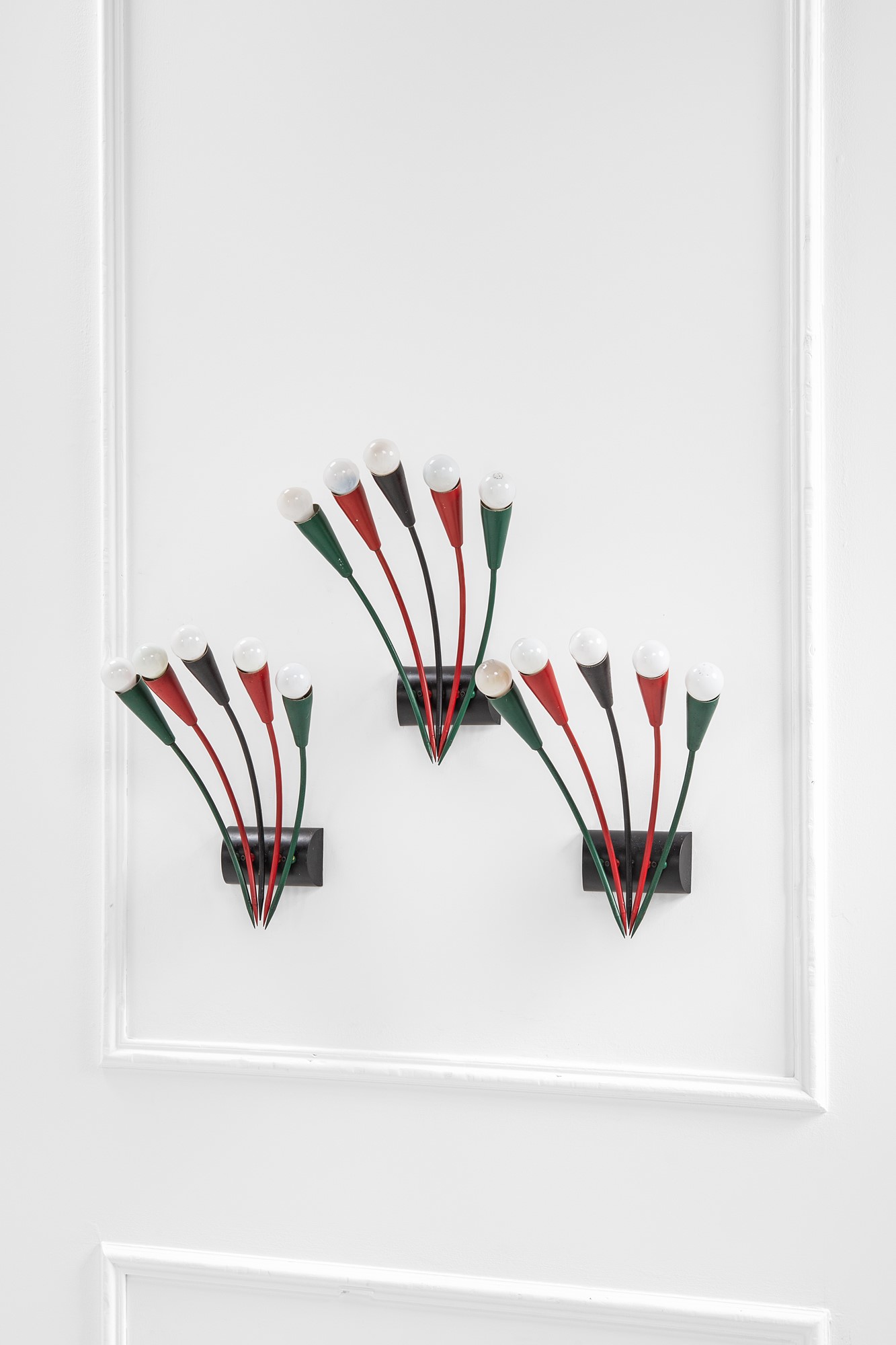 Tre lampade da parete a cinque luci