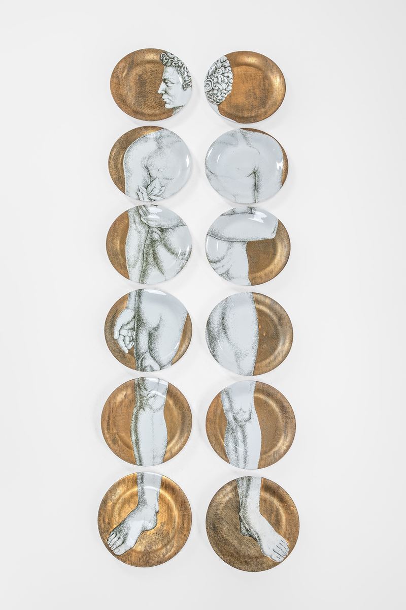 Dodici piatti della serie Adamo, Fornasetti
