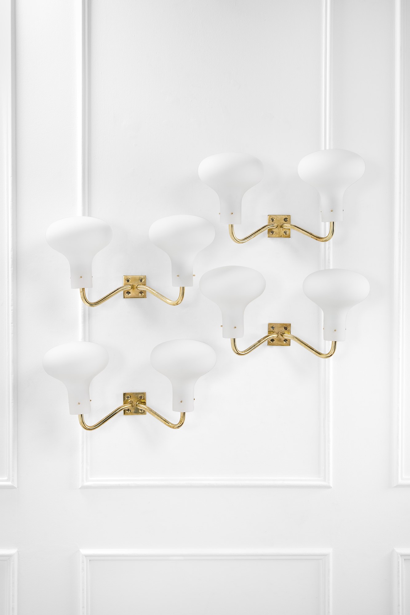 Quattro lampade da parete a due luci della serie Lp 12