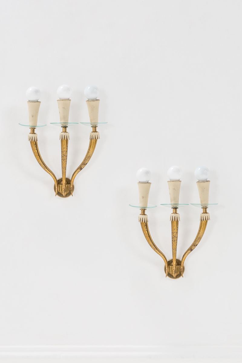 Due lampade da parete a tre luci