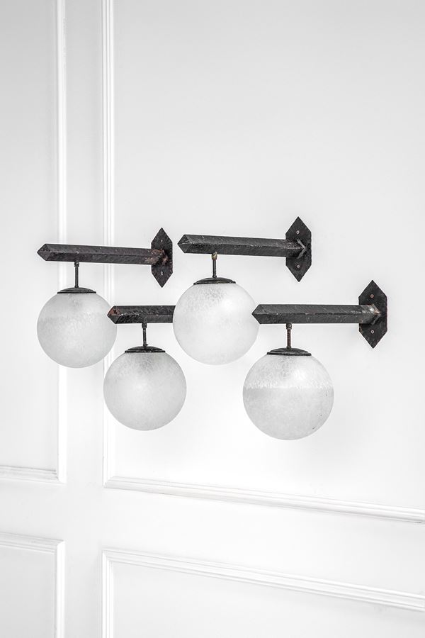 Quattro lampade da parete