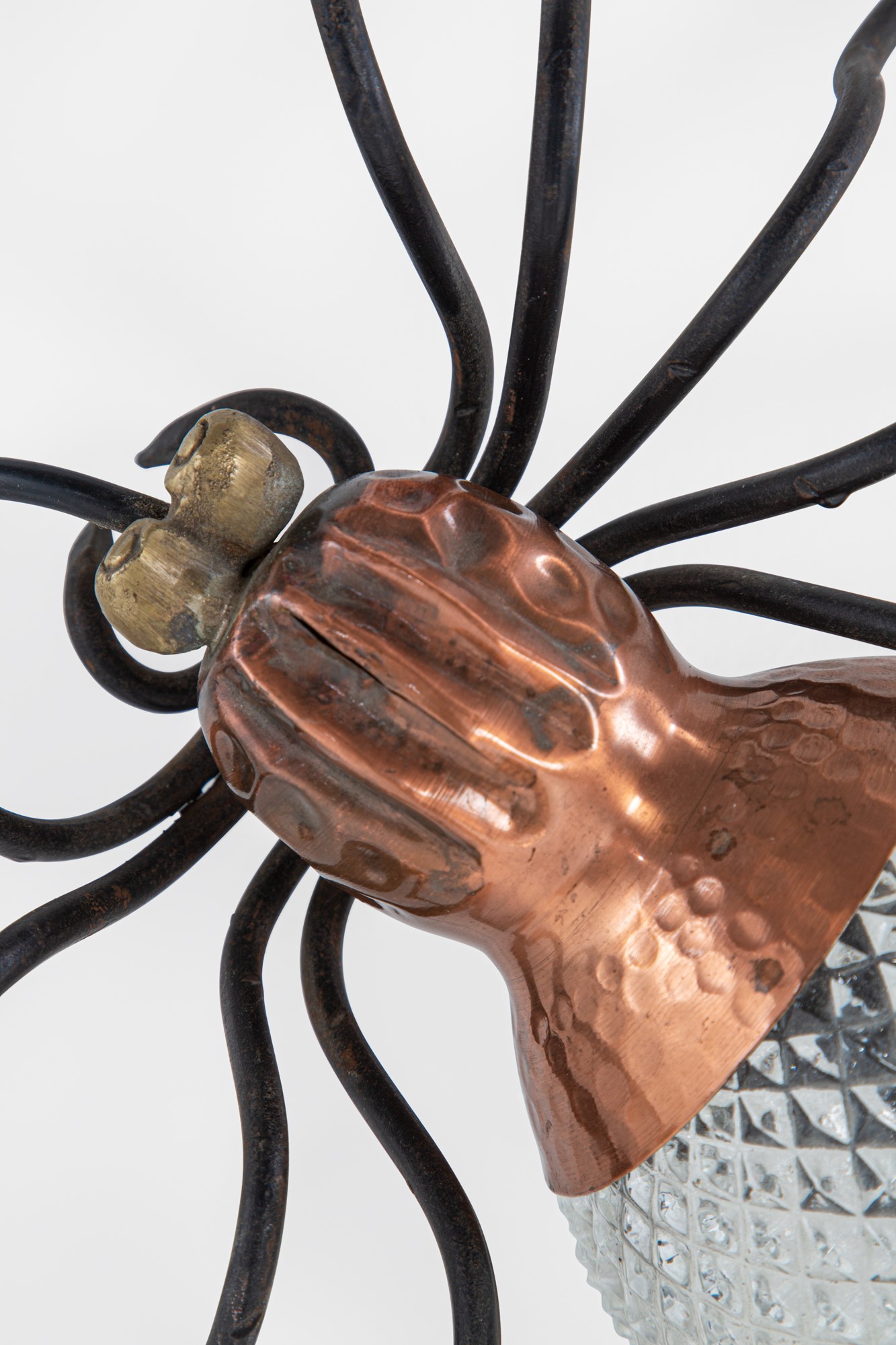 Due lampade da parete a guisa di ragno