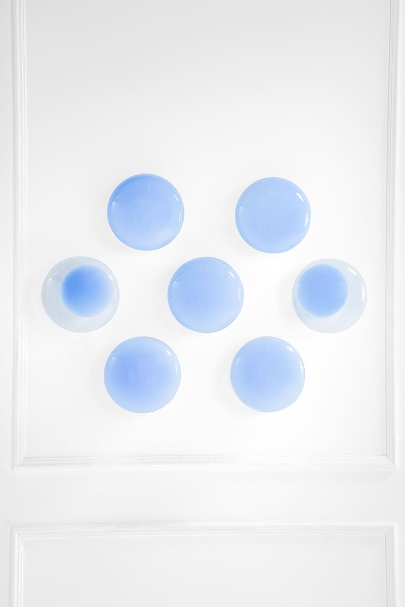 Leucos - Set di sette lampade da parete in vetro trasparente e metallo verniciato