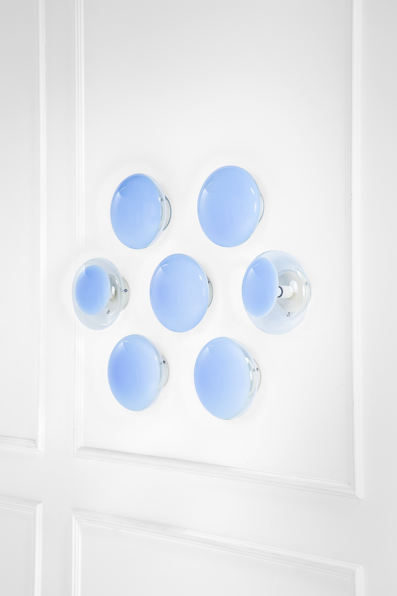 Leucos - Set di sette lampade da parete in vetro trasparente e metallo verniciato