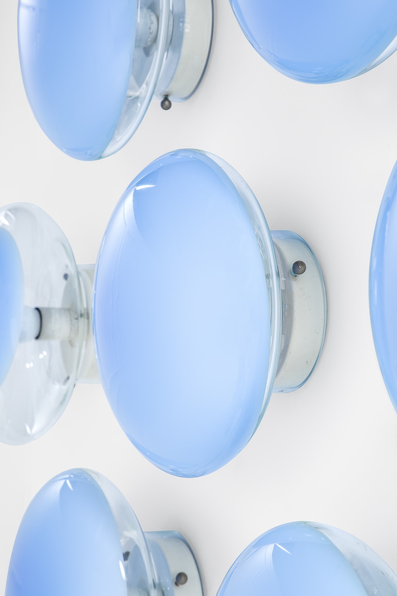 Leucos - Set di sette lampade da parete in vetro trasparente e metallo verniciato