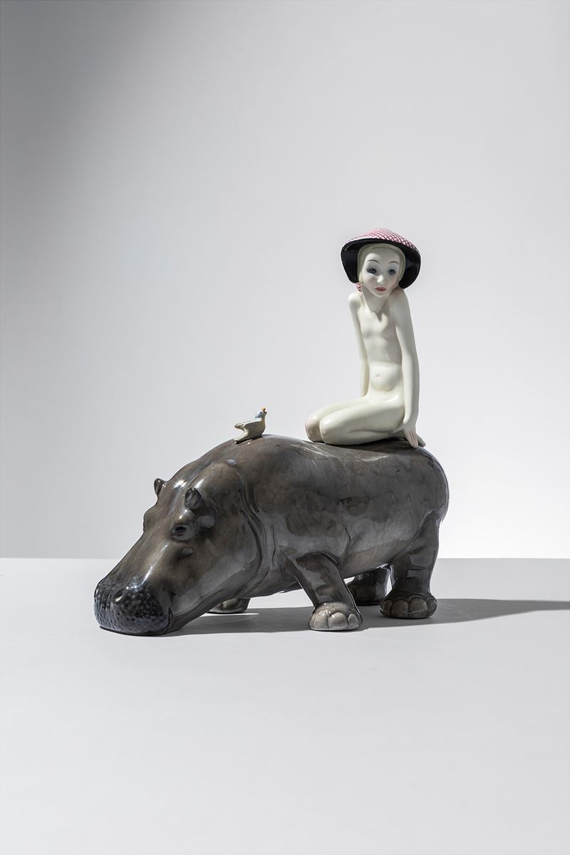 Nudino su ippopotamo