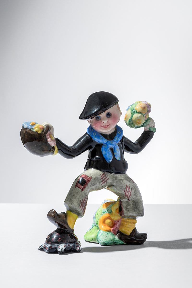 Bimbo con cestino e fiori