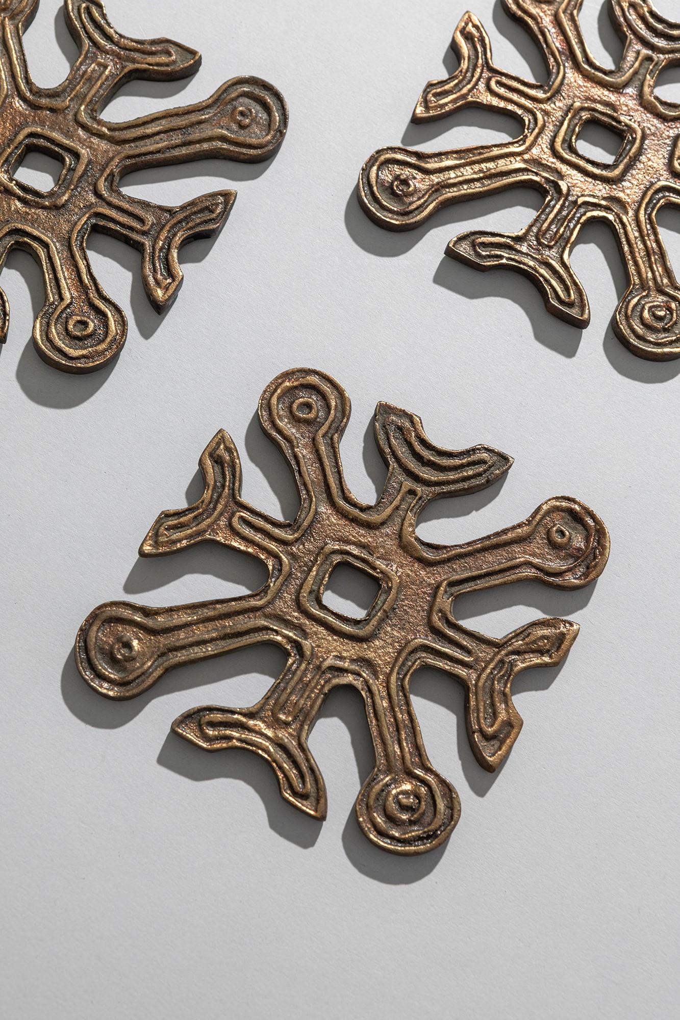 Gruppo di sculture della serie Croci e Stelle