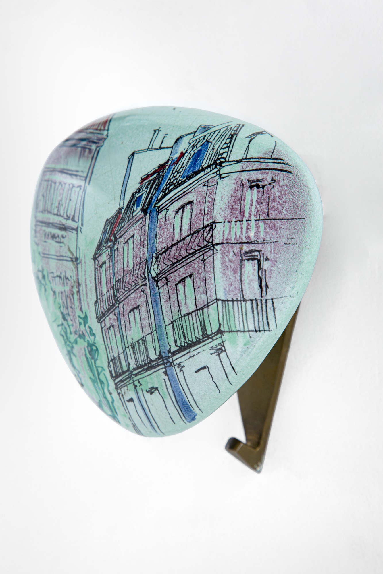 Tre appendiabiti da parete