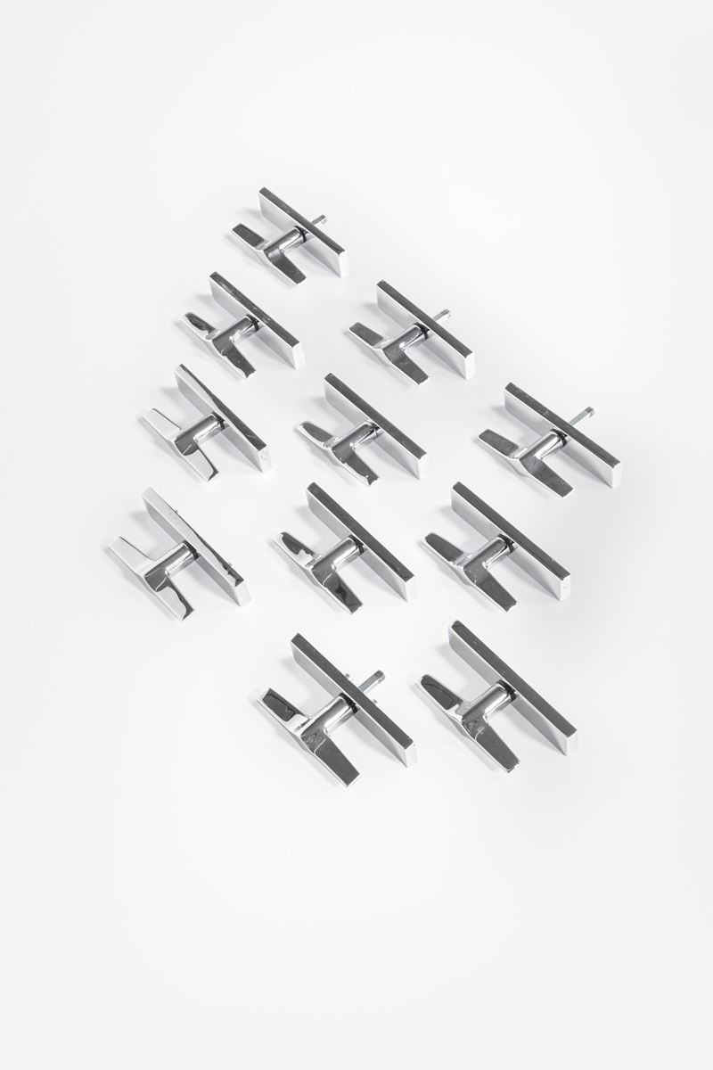 Undici maniglie da finestra della serie Lama