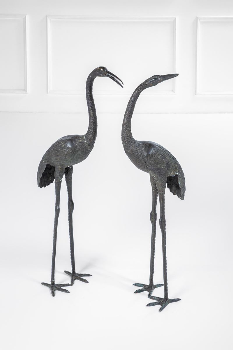 Fusione di metallo, Due sculture raffiguranti gru, 1940 ca.
