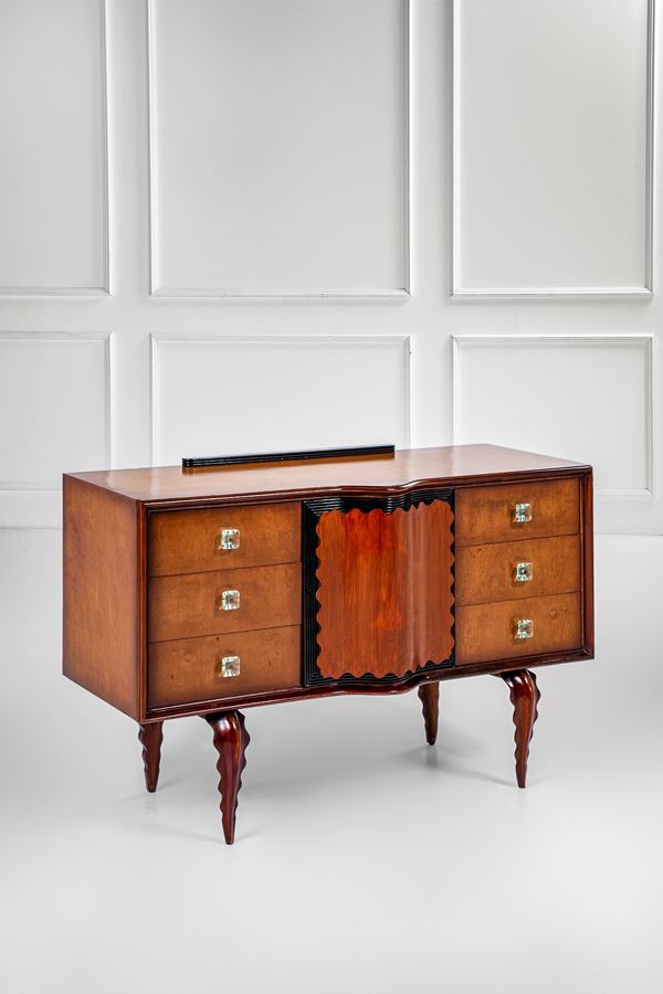 Mobile contenitore a due file di cassetti e anta centrale celante cassetti