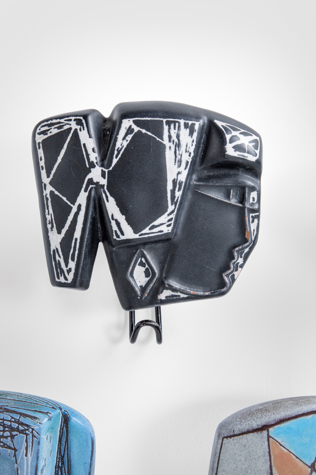 Cinque appendiabiti da parete