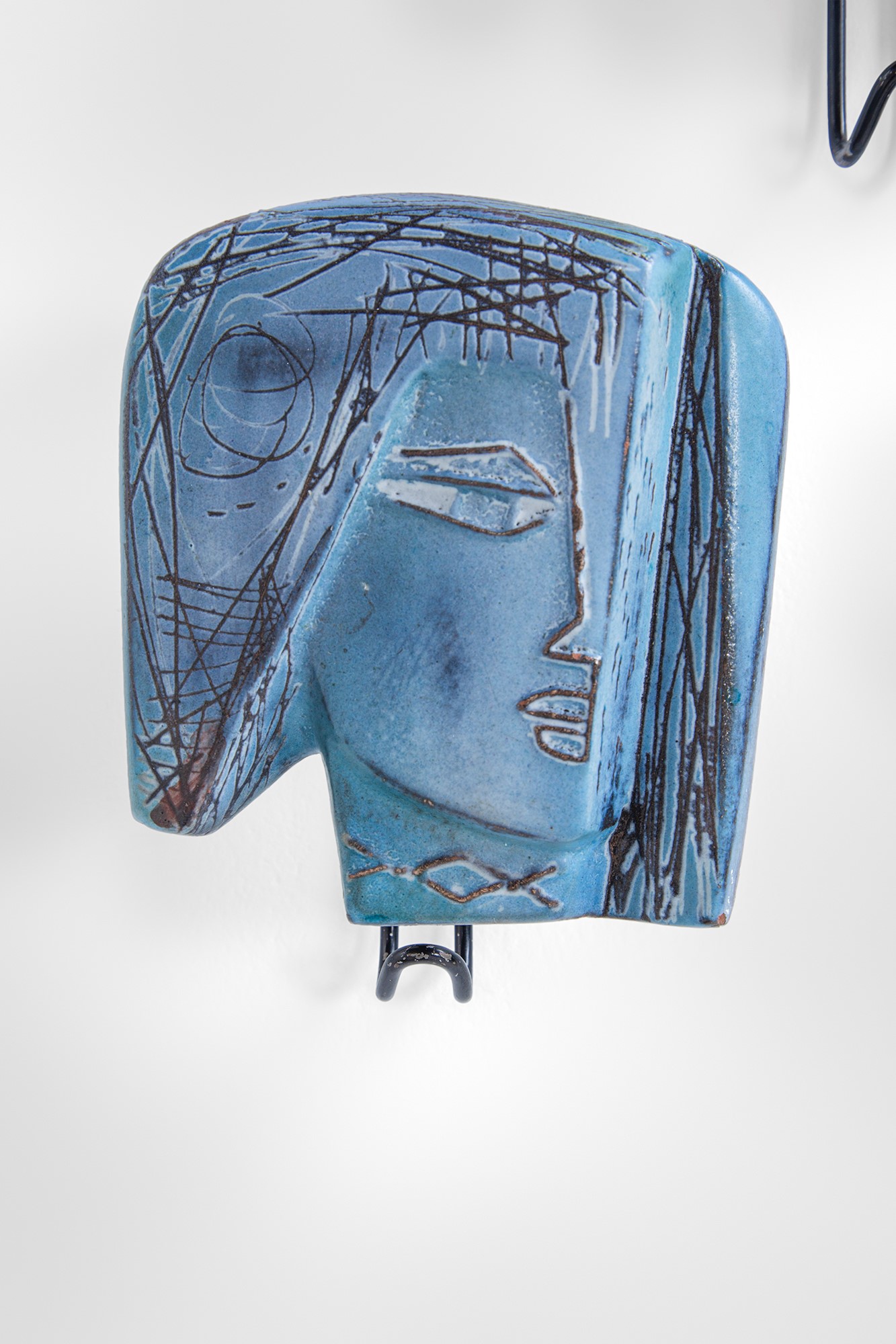 Cinque appendiabiti da parete