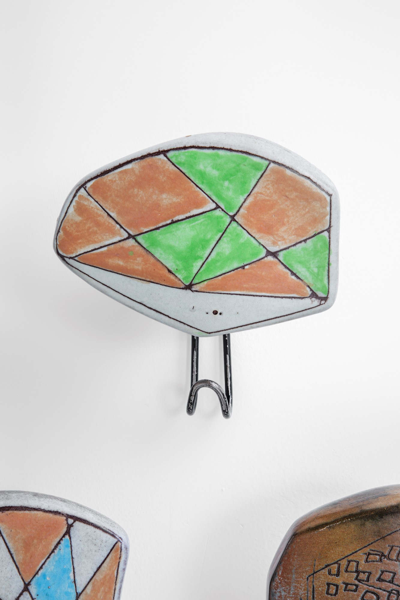 Cinque appendiabiti da parete