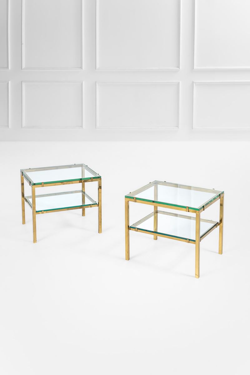 Coppia di tavolini, ottone lucido e cristallo molato (stile industriale), anni 1970 circa