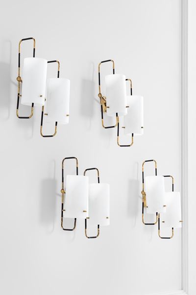 Quattro lampade da parete a due luci
