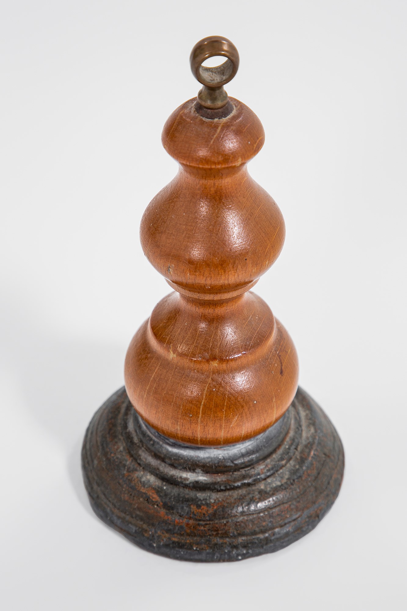 Annonimo, Tre fermaporta in legno tornito, pietra e ottone, circa 1960