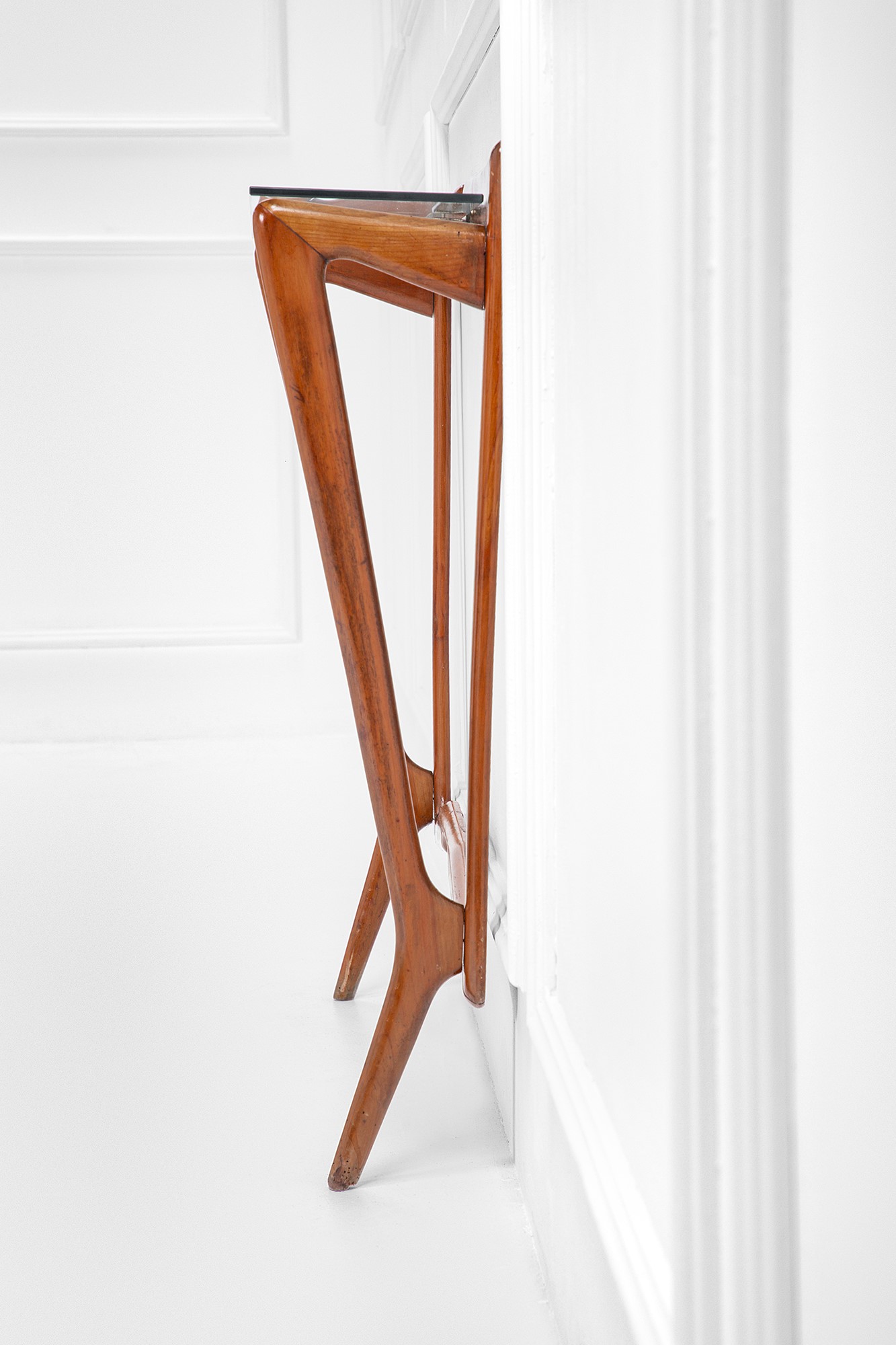 Console, legno sagomato, cristallo molato e ottone, circa 1950