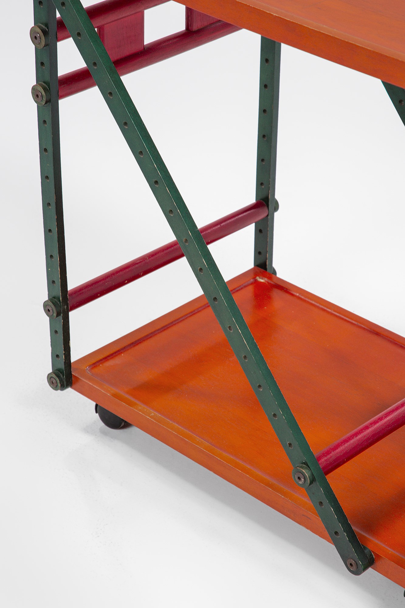 Carrello di servizio “Meccano”, struttura in legno traforato e ottone, anni 1970 ca.