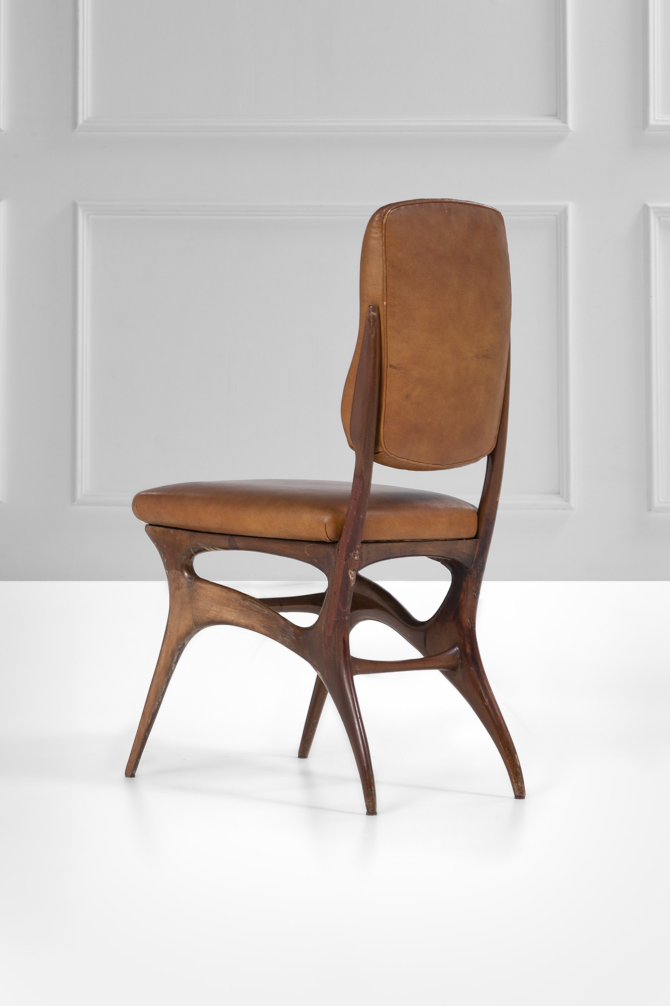 Pierluigi Giordani (attr.) - Sedia in legno tinto sagomato con rivestimento in pelle (c. 1950)