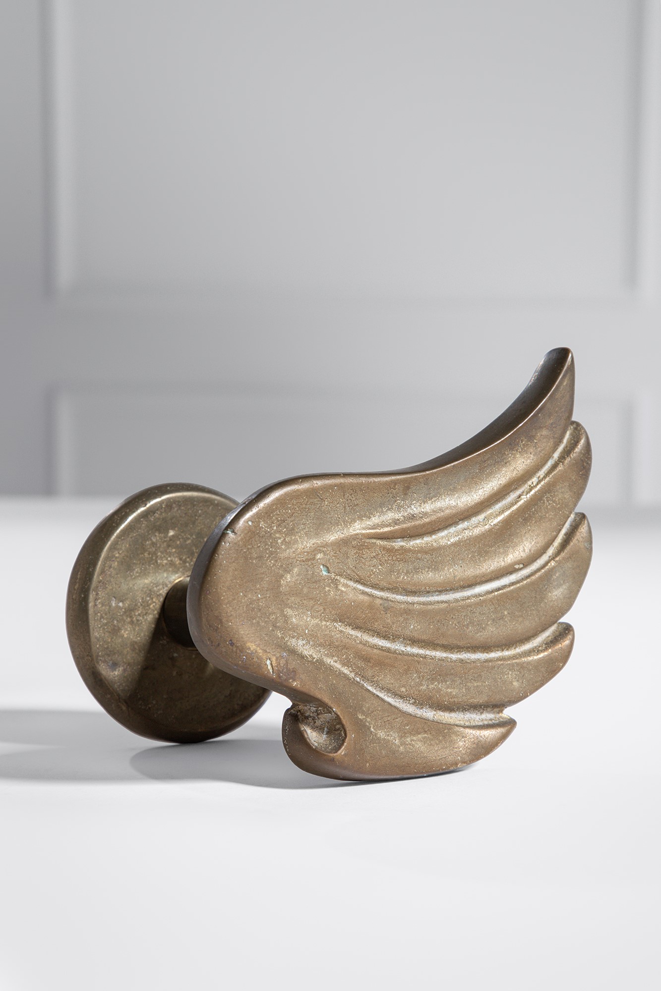 Quattro maniglie, fusione di ottone, circa 1940