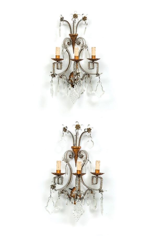 Coppia di appliques a tre luci